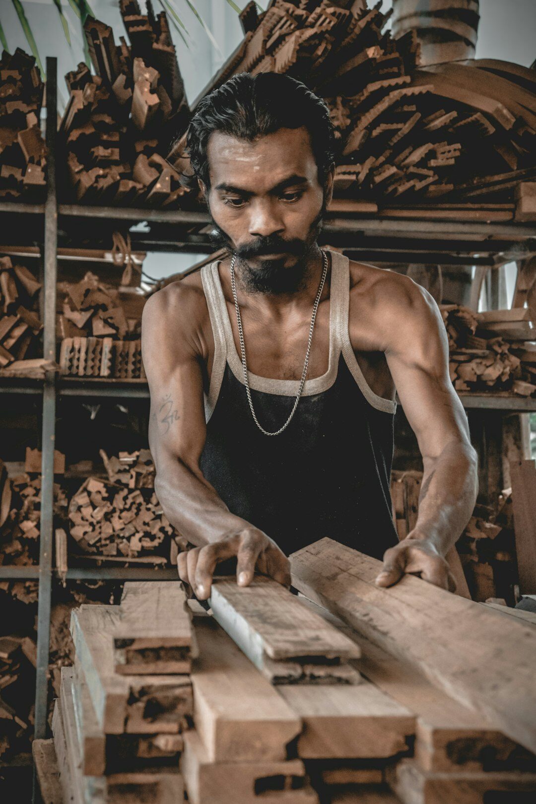 Portrait of a Danish craftsman working with wood in his workshop